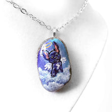 Load image into Gallery viewer, a small beach stone painted with dog art: a black french bulldog as an angel in the clouds. available as a stone keepsake or a pendant necklace