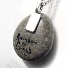 Load image into Gallery viewer, the back of the chihuahua stone, signed wtih "Rainbow of Crazy"