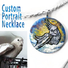 Load image into Gallery viewer, A custom pet portrait painting, on a circle wood necklace, of a grey cockatiel bird as an angel, sitting on clouds