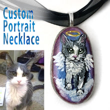 Load image into Gallery viewer, A pendant necklace made from a small beach pebble, hand painted with a custom pet portrait of a grey and white cat as an angel.