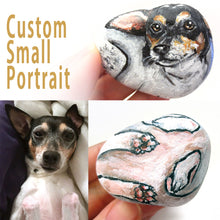 Load image into Gallery viewer, a beach stone hand painted with a portrait of a terrier dog