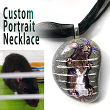 Load image into Gallery viewer, a custom painted pendant necklace, handmade from a beach stone, with a portrait of a broken and white rat climbing the bars of its cage