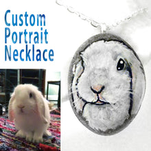 Load image into Gallery viewer, a custom pet portrait necklace of a white bunny rabbit, painted on a small beach rock