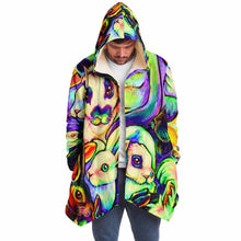 Load image into Gallery viewer, a man wears the bunny lovers rainbow cloak, featuring a bright, all-over rainbow print of different rabbit breeds