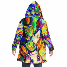 Load image into Gallery viewer, a man wears the bunny lovers rainbow cloak, featuring a bright, all-over rainbow print of different rabbit breeds