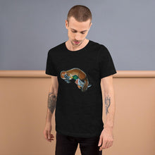 Load image into Gallery viewer, A man is wearing the Platypus Duck Premium T-Shirt in the colour black heather, which includes a print of platypus kissing a mallard duck