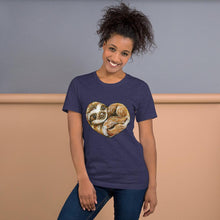 Load image into Gallery viewer, A woman is wearing the Sloth Love Unisex Premium T-Shirt in the colour heather midnight navy, which includes a graphic of a sloth forming the shape of a heart.