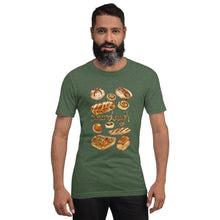 Load image into Gallery viewer, A man is wearing the Sourdough Lovers unisex premium t-shirt in the colour forest green heather, printed with art of 10 different sourdough breads.