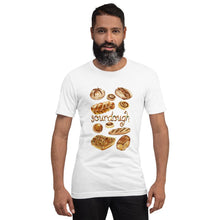 Load image into Gallery viewer, A man is wearing the Sourdough Lovers unisex premium t-shirt in the colour white, printed with art of 10 different sourdough breads.