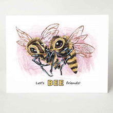 Load image into Gallery viewer, A greeting card reads, &quot;Let&#39;s BEE friends!&quot; with an illustration of two bees flying next to each other.
