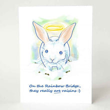 Load image into Gallery viewer, greeting card, illustrated with a whtie rabbit with a halo, sitting on the clouds, surrounded by what looks like rabbit poop. the front reads, &quot;On the Rainbow Bridge, they really ARE raisins :)&quot;
