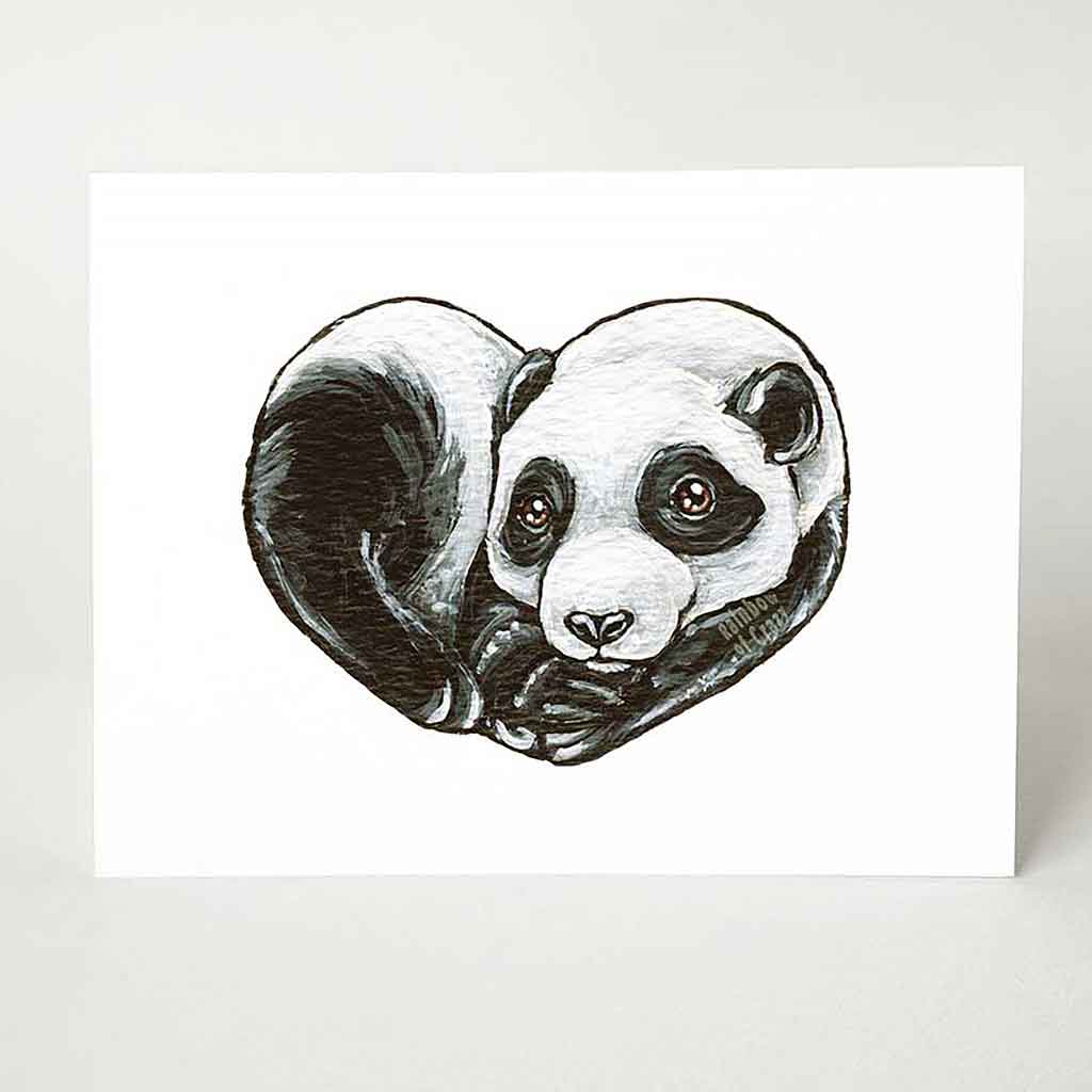 a greeting card featuring an illustration of a panda bear, curled up in the shape of a heart