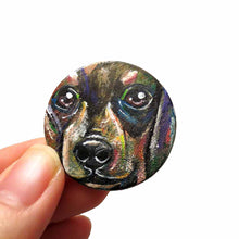 Load image into Gallery viewer, A round wood pendant is hand painted with a portrait of a dacshund dog, and is available as either a keepsake or a pendant necklace
