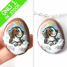 Load image into Gallery viewer, a small beach stone hand painted with the portrait of a beagle as an angel in the clouds, available as a keepsake or pendant necklace
