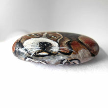 Load image into Gallery viewer, small beach stone hand painted with the portrait of a beagle, compete with paws underneath
