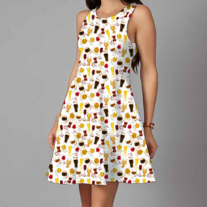 a person wearing the Beer Lovers Dress: a white skater-style dress with a scoop neck and flared skirt, printed with illustrated beer styles in different drink glasses.