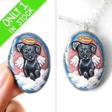 Load image into Gallery viewer, Small rock art of a black labrador retriever dog, painted as an angel, with halo and wings, sitting on clouds. available as a keepsake or pendant necklace
