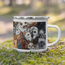 Load image into Gallery viewer, A 12 oz white enamel mug features art of several different bunny rabbit breeds

