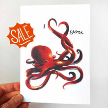 Load image into Gallery viewer, a greeting card illustrated with an octopus. two tentacles making the shape of a heart. text goes around the heart so it says, &quot;I &lt;3 you&quot;
