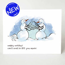 Load image into Gallery viewer, greeting card with an illustration of two snowmen facing each other, both with pained and angry expressions on their faces. multiple branches are in place of their arms, making it appearing as if they&#39;re fighting each other. the card reads &quot;happy holidays. can&#39;t wait to see you again&quot;
