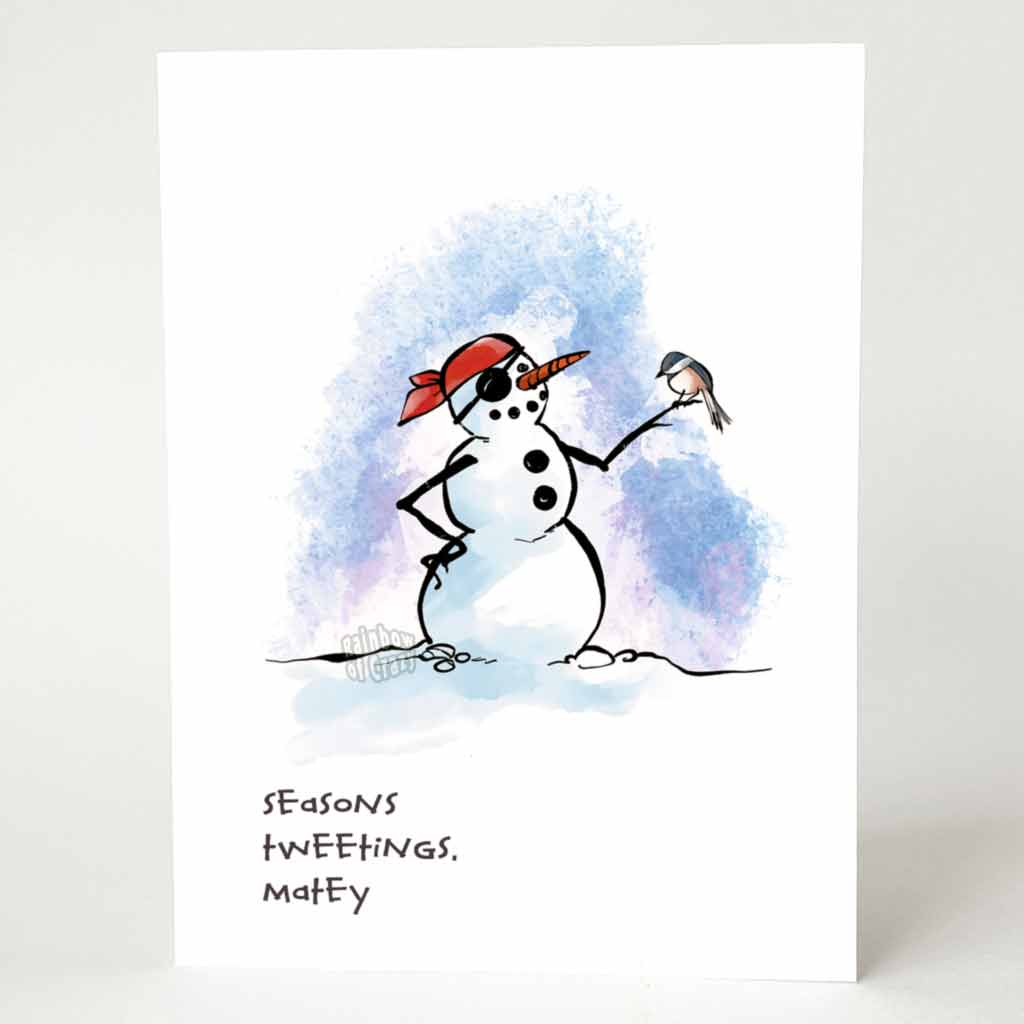 greeting card with an illustration of a smiling pirate snowman, wearing a red bandana and eye patch. a chickadee perches on the snowman's outstretched hand. on the bottom, the card says, 