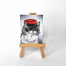Load image into Gallery viewer, a miniature painting of a persian cat wearing a kepi hat
