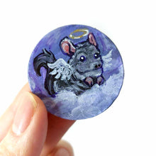 Load image into Gallery viewer, Small lightweight wood disc, hand painted with a portrait of a chinchilla as an angel, with halo and wings, sitting on clouds against a purple sky
