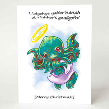 Load image into Gallery viewer, greeting card illustrated with a chibi cthulhu as an angel, with halo, wings, and purple robe. Front reads &quot;Lloigehye yah&#39;or&#39;nanah ot r&#39;luhhor&#39;s gnaiigof&#39;n!&quot; above and &quot;[Merry Christmas!]&quot; below
