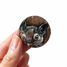 Load image into Gallery viewer, a small wood disc, featuring a painting of a little degu. this painting is available as a pendant or wood keepsake
