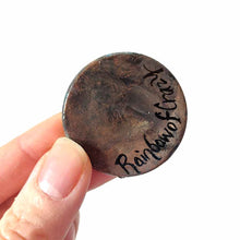 Load image into Gallery viewer, a small wood disc, featuring a painting of a little degu. this painting is available as a pendant or wood keepsake, back signed with rainbowofcrazy
