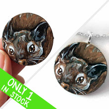 Load image into Gallery viewer, a small wood disc, featuring a painting of a little degu. this painting is available as a pendant or wood keepsake
