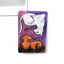 Load image into Gallery viewer, wood magnet on a dishwasher, hand painted with a white cat with the word CLEAN next to it. at the top, upside down, is a Golden labrador dog that is covered in mud, with word DIRTY next to it, background a purple colour
