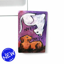 Load image into Gallery viewer, wood magnet on a dishwasher, hand painted with a white cat with the word CLEAN next to it. at the top, upside down, is a Golden labrador dog that is covered in mud, with word DIRTY next to it, background a purple colour
