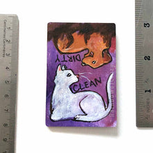 Load image into Gallery viewer, wood magnet on a dishwasher, hand painted with a white cat with the word CLEAN next to it. at the top, upside down, is a Golden labrador dog that is covered in mud, with word DIRTY next to it, background a purple colour
