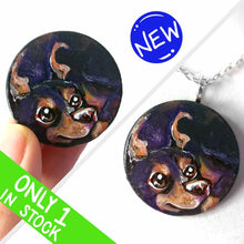 Load image into Gallery viewer, a small lightweight wood disc, hand painted with the portrait of a cute doberman dog. available as a wood keepsake or pendant necklace. 
