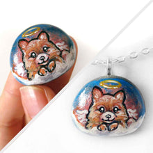 Load image into Gallery viewer, a small stone, hand painted with a portrait of a Pomeranian dog as an angel in the clouds, available as a keepsake stone or pendant necklace 
