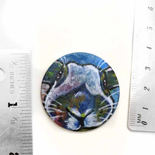 Load image into Gallery viewer, a small round wood disc, hand painted with a portrait of an English Spot rabbit, face up close, painted in rainbow colours. it&#39;s available as a keepsake or pendant necklace
