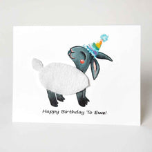 Load image into Gallery viewer, a greeting card featuring an illustration of a smiling black sheep with white fleece, wearing a rainbow party hat. its fleece is made with real fleece fabric. the front reads, &quot;Happy Birthday to Ewe!&quot;
