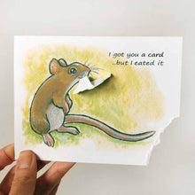 Load image into Gallery viewer, a greeting card, illustrated with a smiling mouse. a corner of the card is ripped and hangs from the mouse&#39;s mouth. the text reads, I got you a card .. but I eated it
