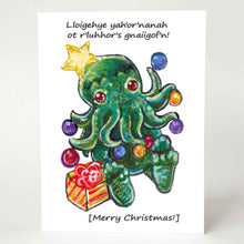 Load image into Gallery viewer, a greeting card with an illustration of a Cthulhu dressed as a Christmas tree. The card reads,  &quot;Lloigehye yah&#39;or&#39;nanah ot r&#39;luhhor&#39;s gnaiigof&#39;n!&quot; above and &quot;[Merry Christmas!]&quot; below
