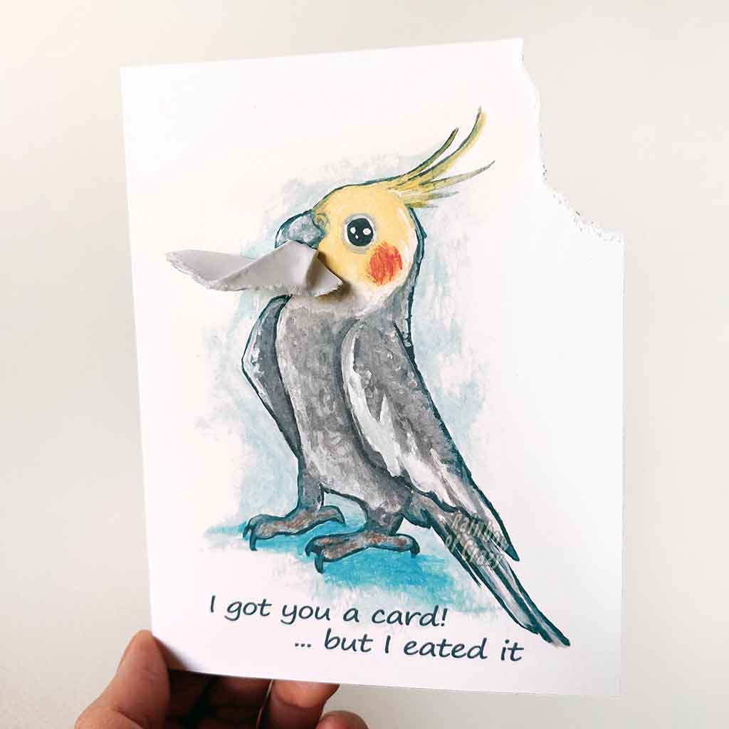 a greeting card with art of a gray and yellow cockatiel. The card reads, 