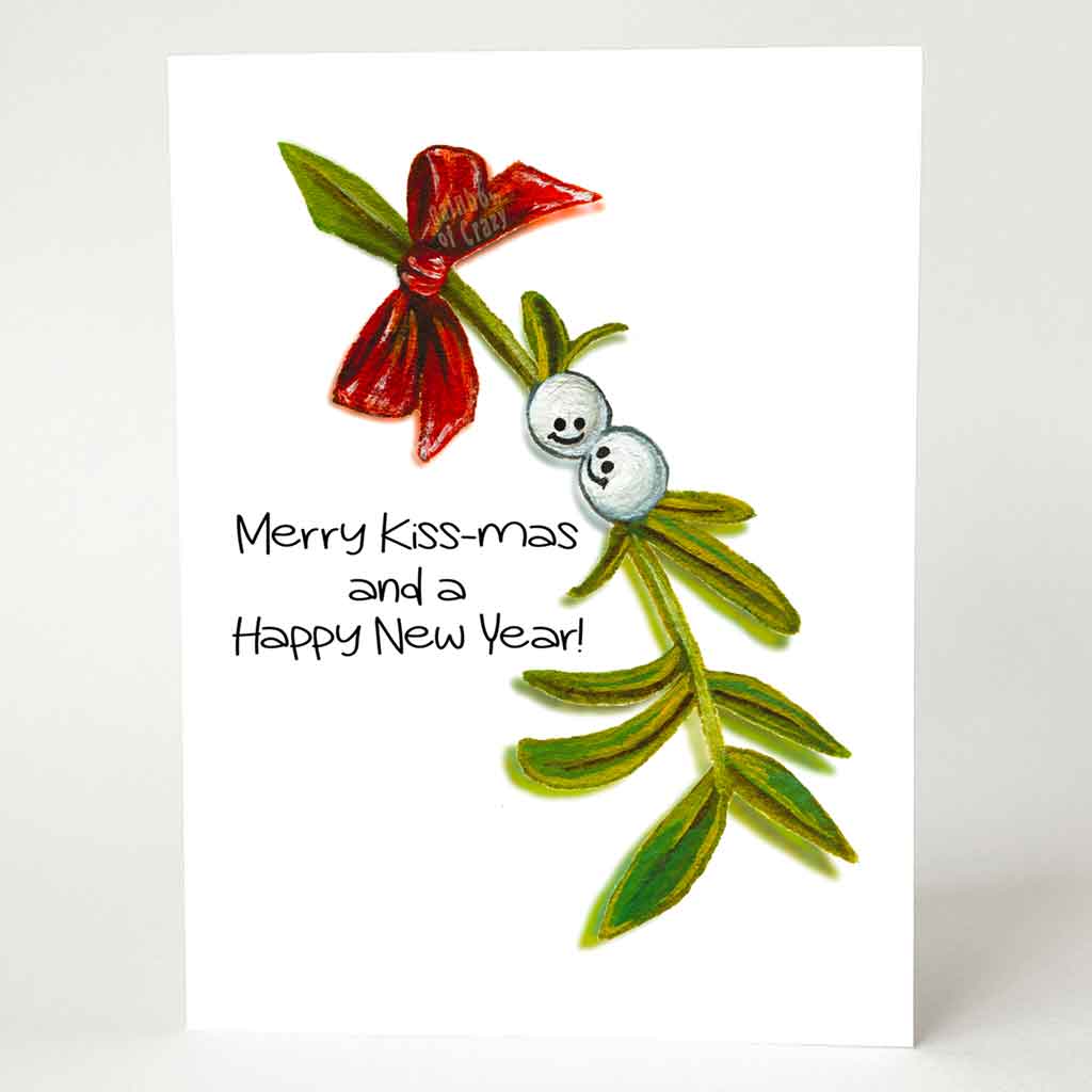 a greeting card illustrated with smiling mistletoe. the card reads,  Merry Kiss-mas and a happy new year!