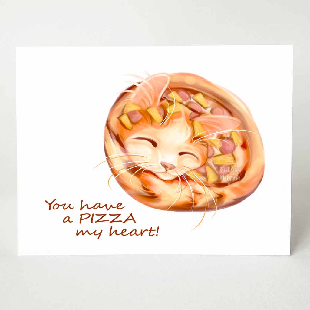 a greeting card with an illustration of an orange cat shaped like a pizza, covered in Hawaiian toppings. Text says 