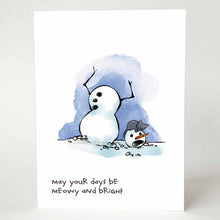 Load image into Gallery viewer, greeting card with an illustration of a snowman, whose head has fallen to the ground, looking horrified. a black cat is taking a nap on the snowman&#39;s head. on the bottom, the card says, &quot;may your days be meowy and bright&quot;
