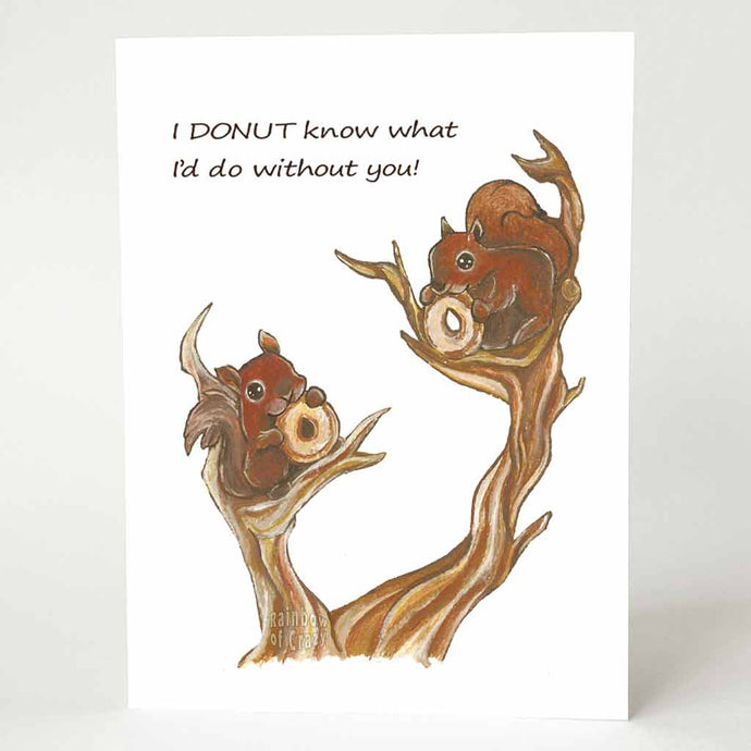 a greeting card illustrated with a two squirrels sitting on a tree, each eating a donut. the card says 