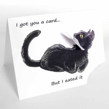 Load image into Gallery viewer, a greeting card, with an illustration of a sitting black cat. the bottom right corner of the card is ripped off and hangs from the cat&#39;s mouth. card reads, &quot;I got you a card... But i eated it&quot;
