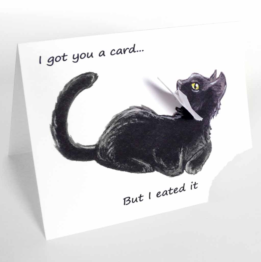 a greeting card, with an illustration of a sitting black cat. the bottom right corner of the card is ripped off and hangs from the cat's mouth. card reads, 