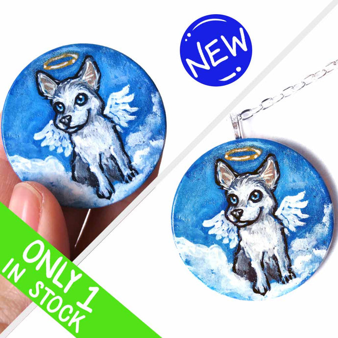 a lightweight wood disc, hand painted with a portrait of a husky dog as an angel in the clouds against a blue sky. available as a keepsake or pendant necklace
