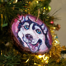 Load image into Gallery viewer, a wood ornament hand painted with a close-up portrait of a husky dog, smiling really big
