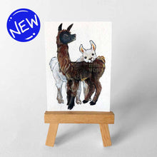 Load image into Gallery viewer, an aceo sized painting of a brown and black llama, with a white llama behind, resting their head on the brown llama&#39;s back
